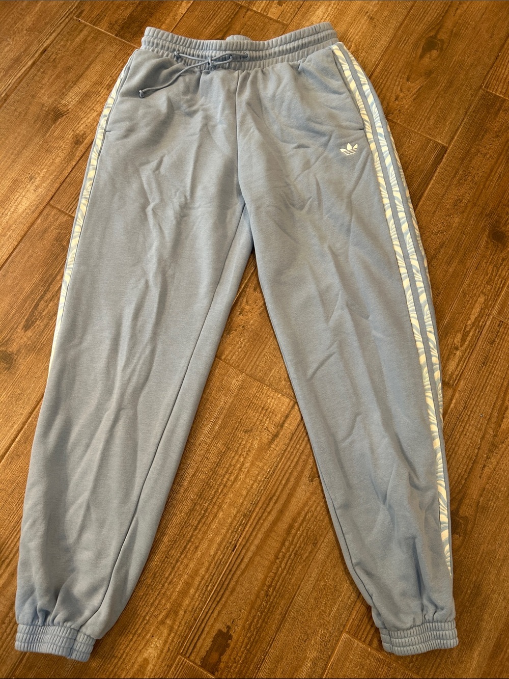 adidas woman’s  Light Blue Jogger Pants with White Side Stripes